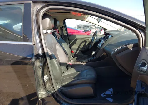 2015 Ford Focus Titanium from USA, damaged, VIN 1FADP3J29FL214819